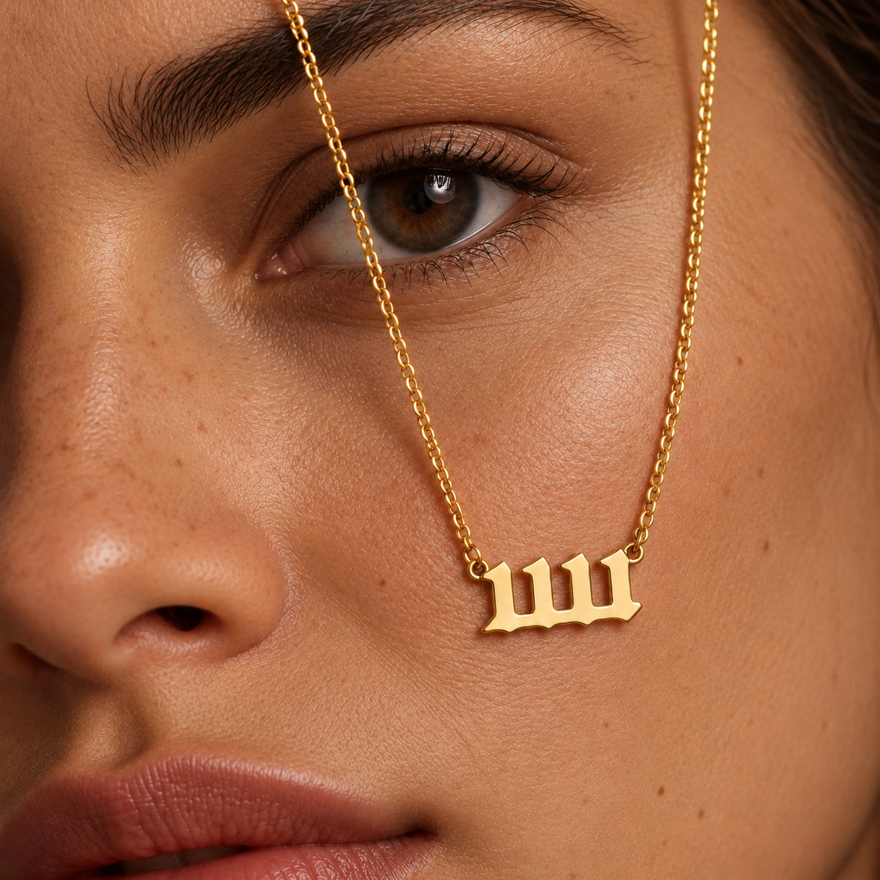 11:11 necklace in gold, editorial close-up