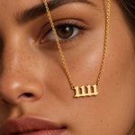 11:11 necklace in gold, editorial close-up