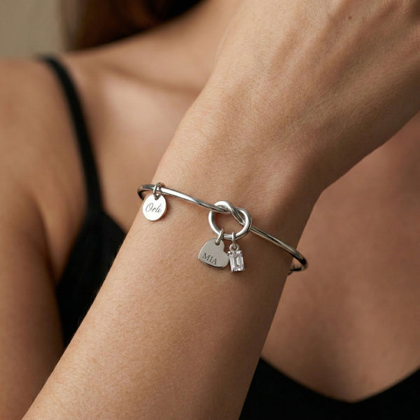 Mya Engravable Heart & Birthstone Knotted Bangle in Silver