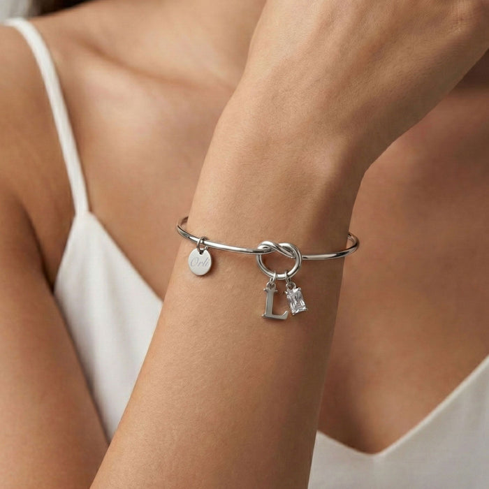 Initial & Birthstone Knotted Bangle in Silver