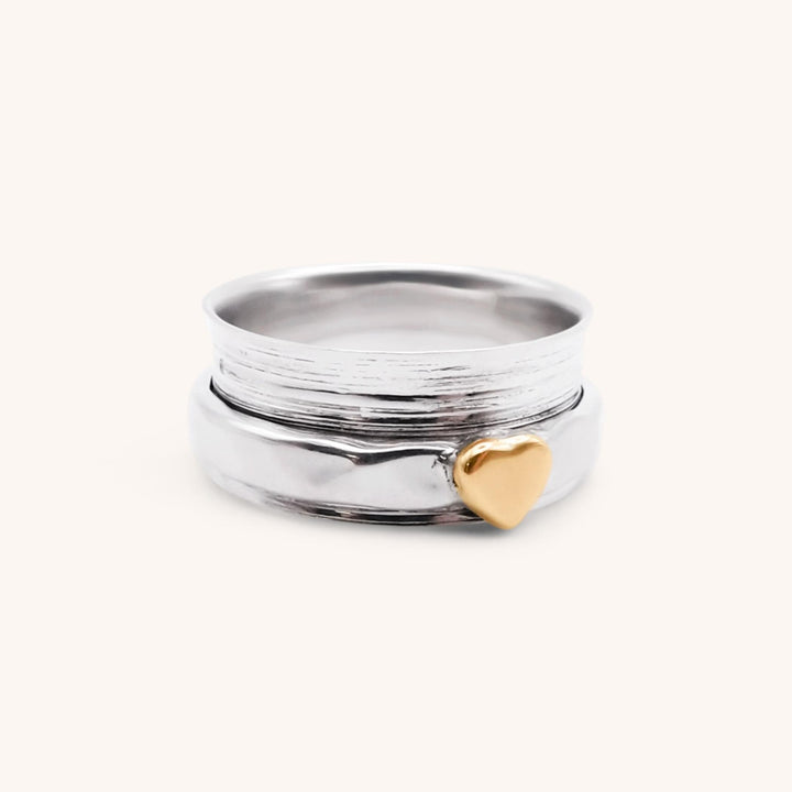 Sterling Silver Spinner Ring with Single Gold Heart