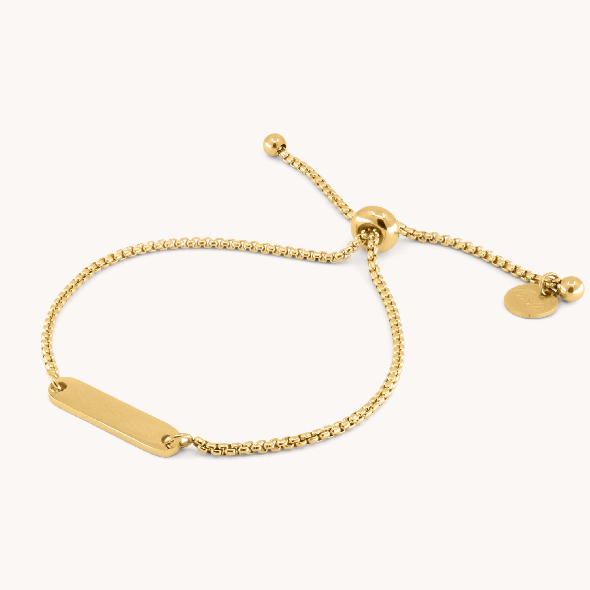 Gold adjustable box chain bracelet with bar plate in 18k gold-plated stainless steel – waterproof & tarnish-free.