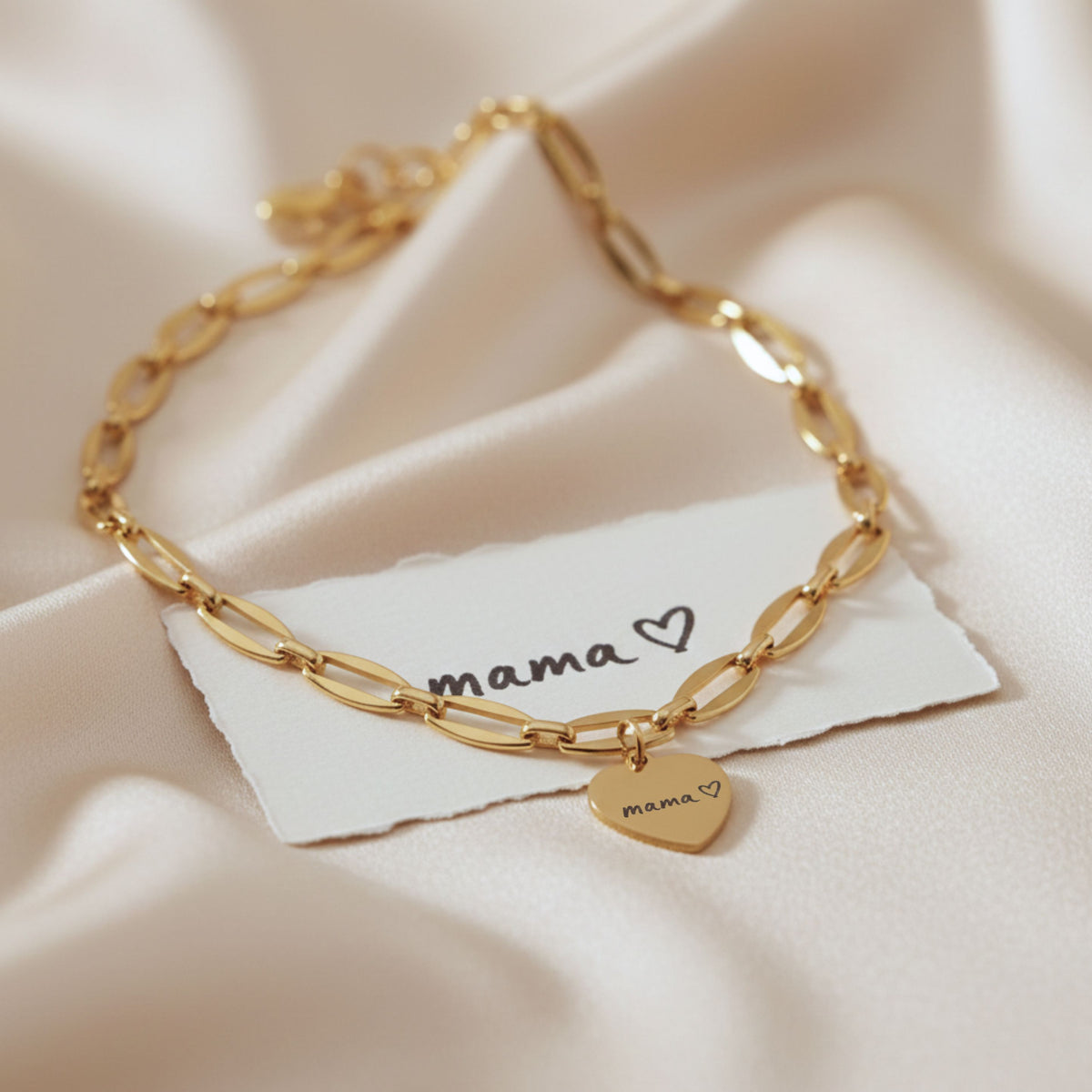 Handwritten message engraved on a gold heart necklace