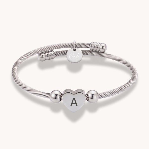 Initial Heart Twist Bangle in Silver