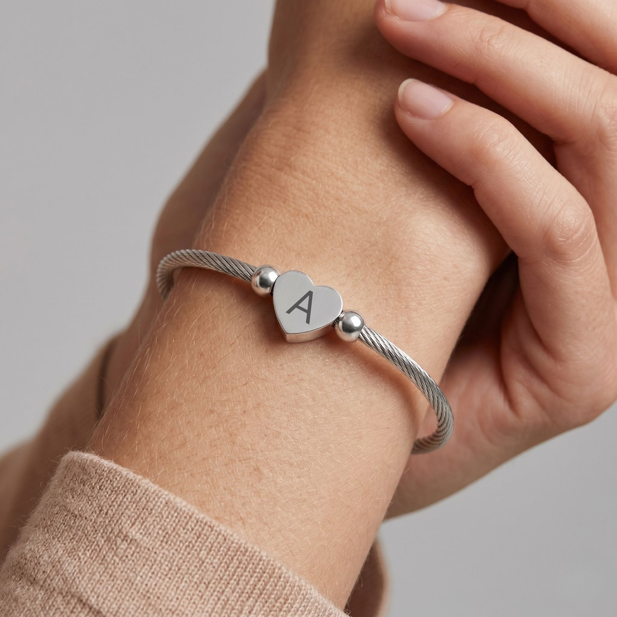 Initial Heart Twist Bangle in Silver