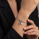 Initial & Birthstone Forever Knot Bracelet in Silver - worn shot