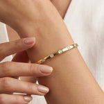 Kirstie Square Crystal Bangle in Gold worn on wrist