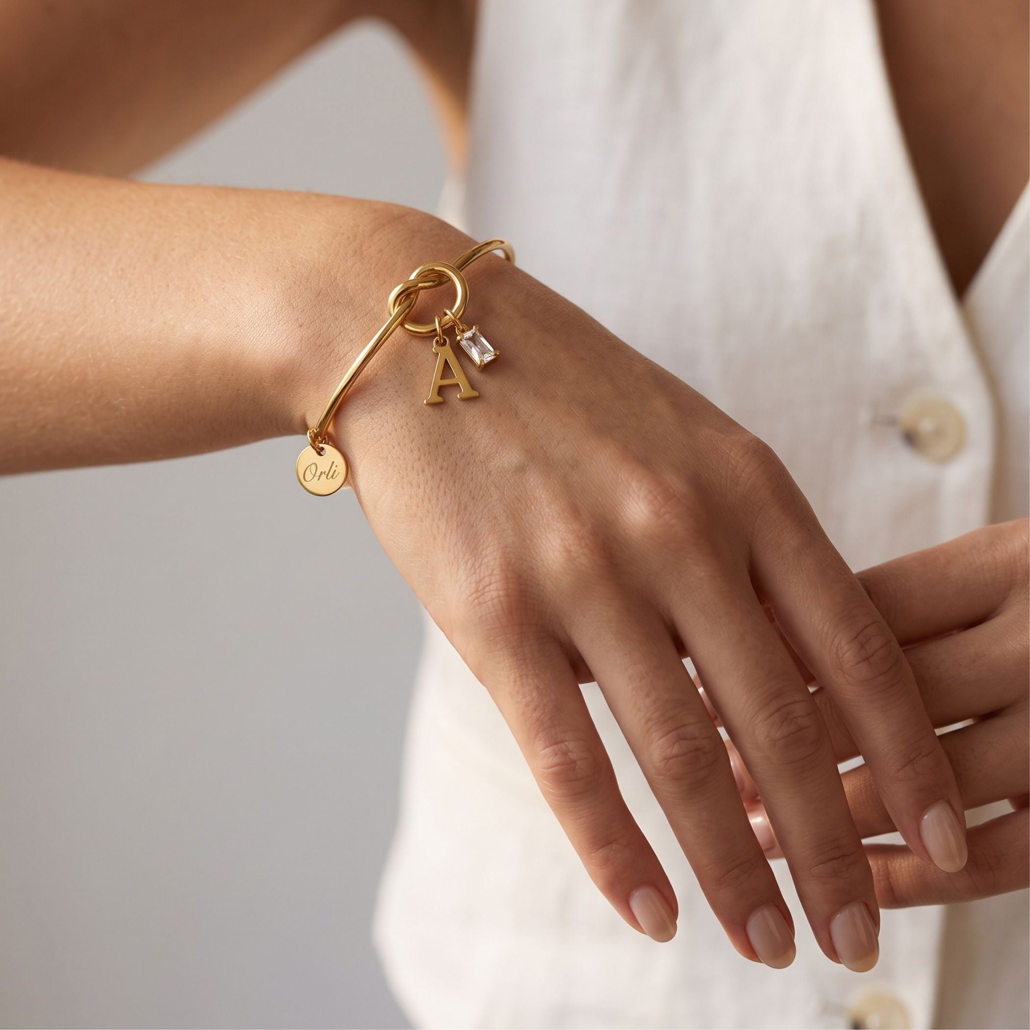 Initial & Birthstone Knotted Bangle in Gold