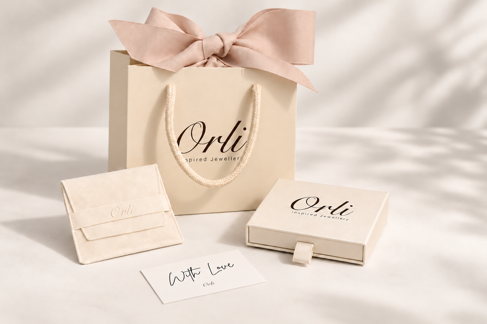 Orli luxury gift bag with pale blush bow, square box, suede pouch and small flat With Love card