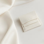 Orli jewellery pouch included with your necklace