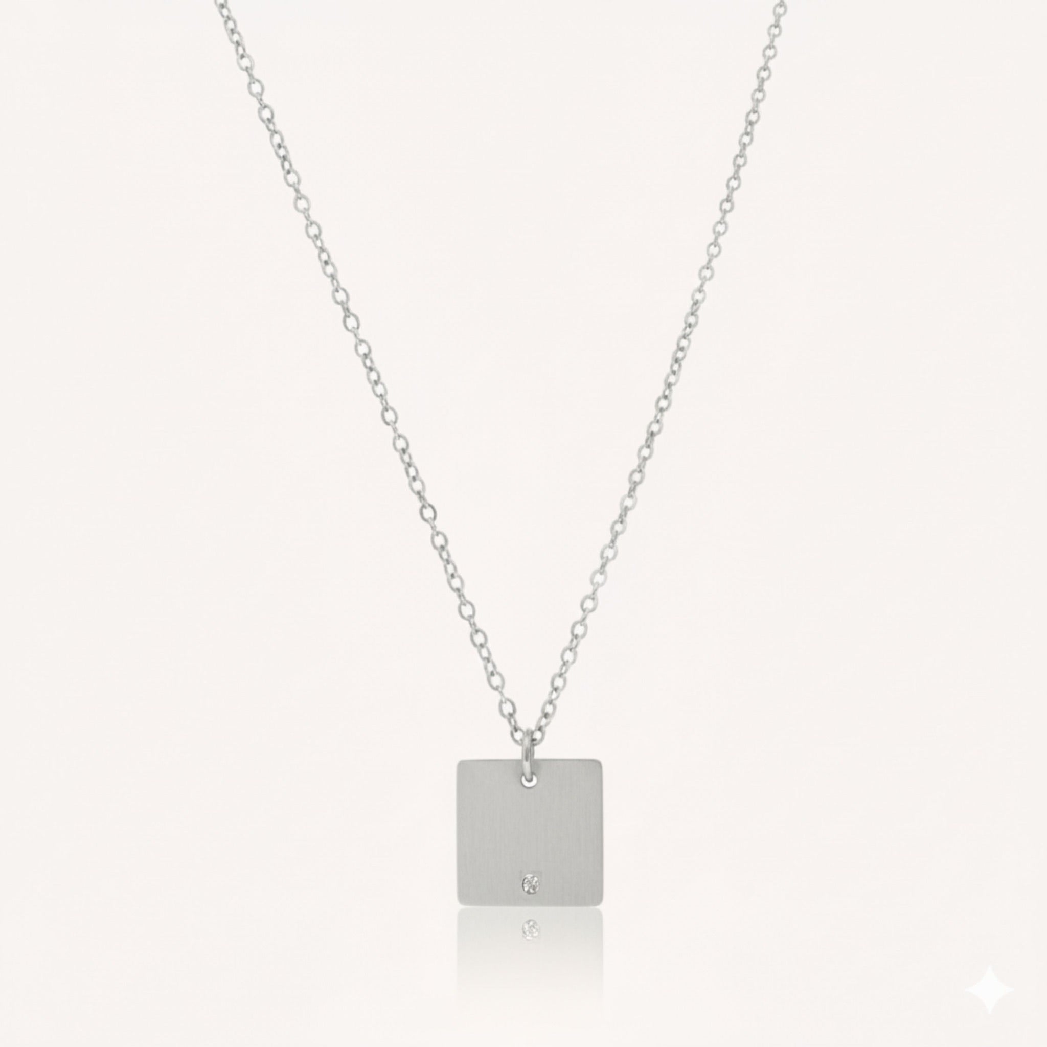 Silver square pendant necklace with CZ detail in stainless steel – waterproof & tarnish-free.